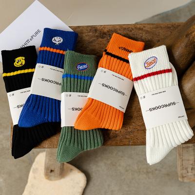 China 2021 Amazon QUICK DRY Wholesale unisex custom logo socks bestsellers custom design sports standard casual football crew long socks for men for sale