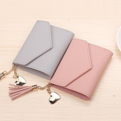 China Newest Fashion Tassel Waterproof Women Wallet PU Small Luxury Short Clips Women's Credit Card Wallets for sale