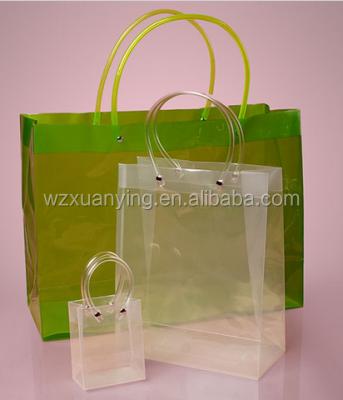 China Hot Sale Clear Mirror Tube Handle Handled PVC Outdoor Shopping Bags for sale