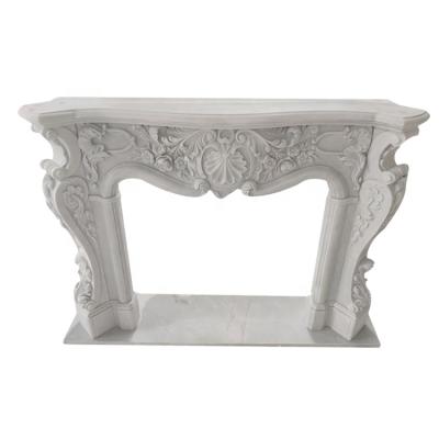 China Modern Decoration Sculpture Hand Carved White Rustic Marble Stone Fireplace Mantel for sale