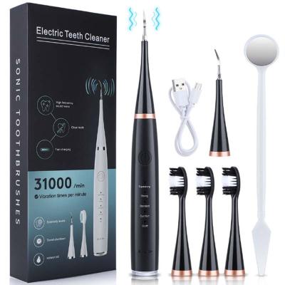 China Oral Regenerative Electric Dental Calculus Remover With Toothbrush For Teeth Cleaning Rechargeable Stain Plaque Removal Ultrasonic Tooth Cleaner for sale