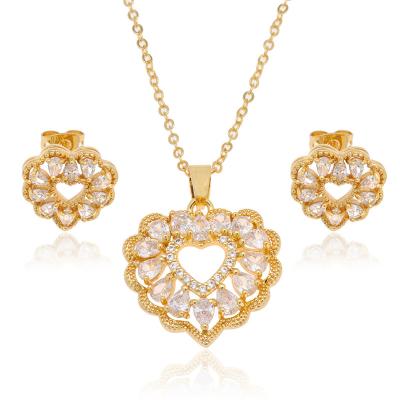 China TRENDY White Cubic Zirconia Claw Clasp Inlaid Jewelry Brass Gold Plated Ladies Fashion Jewelry Set Necklace And Earring Set for sale