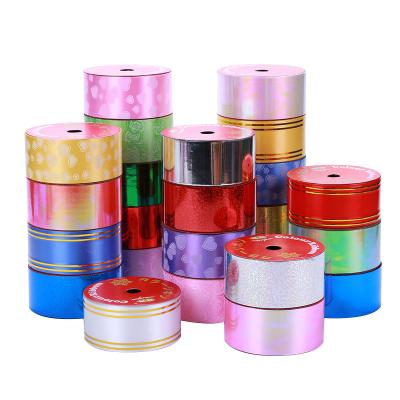 China Single Color With Line Wholesale 5cm Ribbon Christmas Party Birthday Gift Wrapping PP Plastic Gold Edging Ribbon for sale