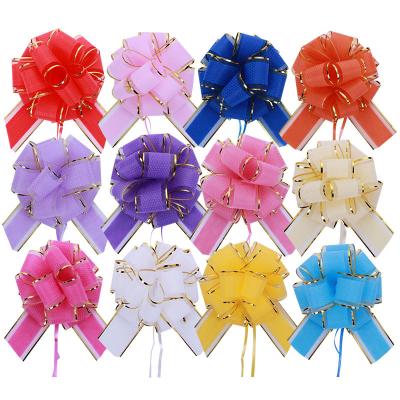 China Wholesale High Quality Gift Wrap Organza Pull Ribbon Bow Wedding Decoration Gift Wrap Organza Pom Pom Pull Bows With Gold Line for sale