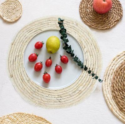 China Sustainable Kitchen Table Mat Round Natural Vegetable Plankton Place Mat for sale