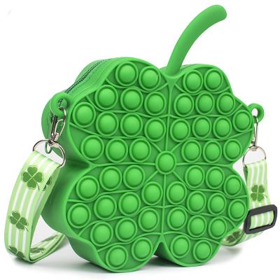 China Gently 2022 new design kids jump itting backpack messenger bag silicone clover easter than other backpacks jump it backpack for sale