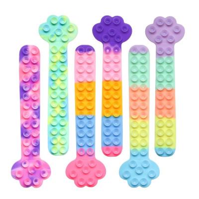 China Factory outlet cat paw squidopop fidgety person toy silicone sheet fidgety person game sucker eco-friendly squidopops for sale