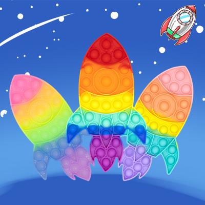 China New Soft Set Push Rocket Rocket Jet Board Game Boys Toys Moving Person Sensory Toy For Children for sale