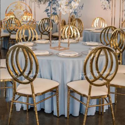 China Modern Antique Modern Wedding White Leather Lighten Metal Dining Chair Gold for sale