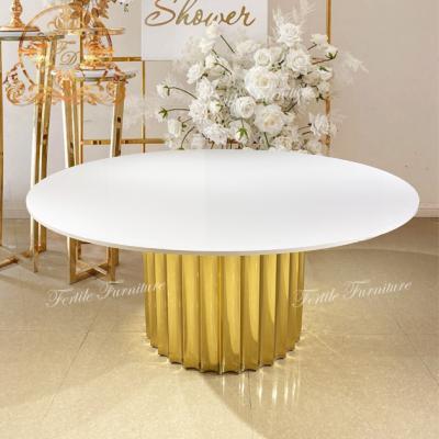 China Modern gold stainless steel base around unique dining table for sale