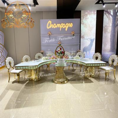 China Best modern design wholesale stainless steel base led half moon serpentine table wedding for sale