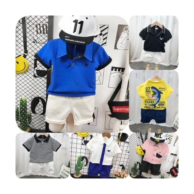 China Handsome foreign style two-piece set baby boy clothes 2023 summer casual children's clothes lapel net red children's polo shirt for sale