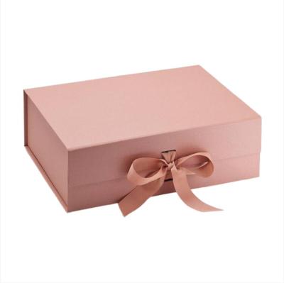 China Low MOQ Foldable Luxury Hardboard Pink Color Lamination Swimsuit Gift Packing Magnetic Box With Ribbon for sale