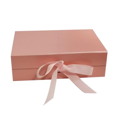 China Recyclable Custom Luxury Paper Garment Flap Magnet Box Flip Top Gift Boxes With Removable Ribbon Closure for sale