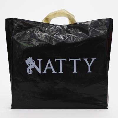 China Recyclable Custom Hot Sale Plastic Bag PE Clothes Packaging Plastic Bag With Handle For Shopping Women for sale