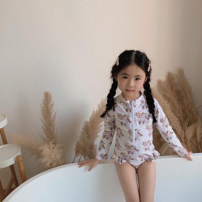 China 2022 New Wholesale Antibacterial Recycle Reversible Children's Bathing Suit Long Sleeve Floral Print Kids Swimwear High Quality Bikini for sale