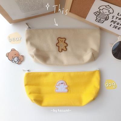 China Inverted trapezoid Instagram Teen Cute Bear Puppy Embroidery Triangle pen bag Canvas student stationery pencil bag for sale