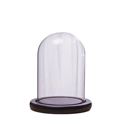 China Europe Amazon Wholesale Price Decorative Flower Hot Selling Glass Dome With Black Wooden Base for sale