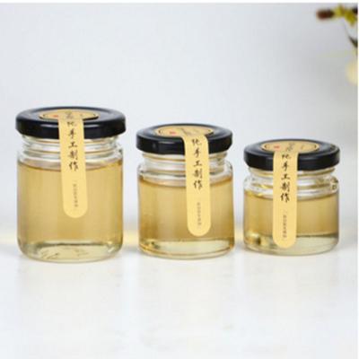 China Wholesale Factory Price Different Sizes Steamable Mini Glass Bottle Available For Honey for sale