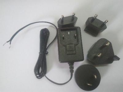 China 12V 1AInterchangeable plug adapter power supply, 12V 1A AC/DC switching power supply with EU,UK,AU,USA for sale