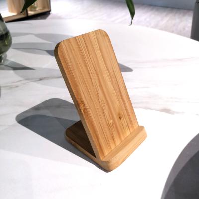 China Promotion Customized Logo Home Wireless Charger Eco-Friendly Wooden Bamboo Holder Stand Smartphone Cell Phone for sale