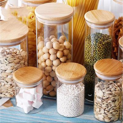 China Sustainable Home Use Heat Resistant Clear Round Glass Kitchen Canisters Bamboo Lids Clear Glass Food Storage Jar for sale