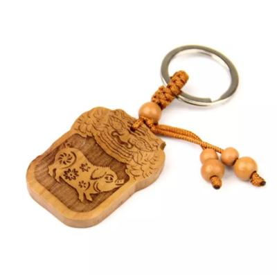 China China wood carved zodiac pendant pig for sale