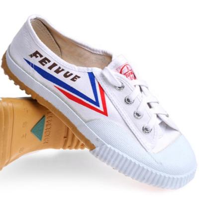 China 2020 Classic Low Design Student Canvas Sneakers Boy Girl Lightweight Casual Flat Shoes Cut White Black Stripe for sale