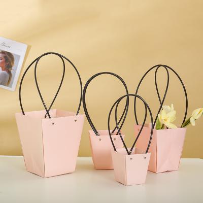 China Recyclable Customize Logo Pink Waterproof Kraft Bags Trapezoid Plant Flower Box Baskets Flower Wrapping Present Box Valentine's Day for sale