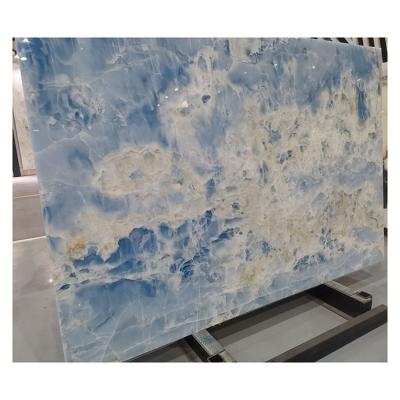 China Modern Natural Sky Gold Wall Light Back Gemstone Marble Stone Blue Onyx for sale