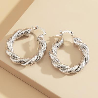 China Minimalist Eco Friendly Design Women Jewelry Hypoallergenic Exaggerated Circle Earring Twisted Circle Statement Earrings For Women for sale