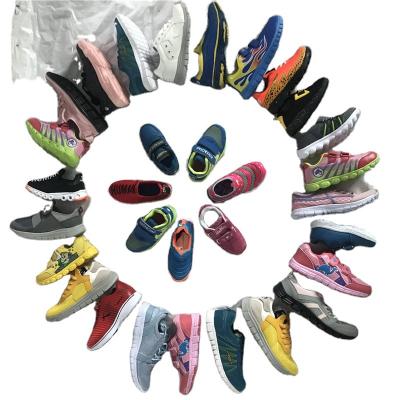 China Children KuoMing Second Hand Sport Shoes MenUsed Leather Shoes for sale