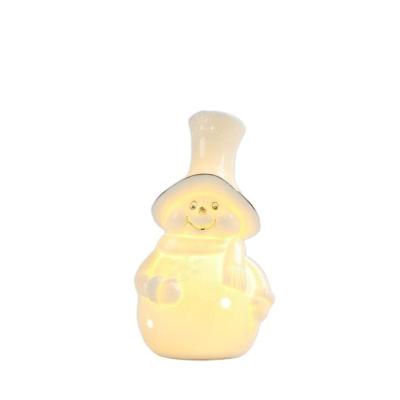 China Christmas Decorations LED Light Home Children Christmas Decorations Christmas Village Skiing Snowman for sale