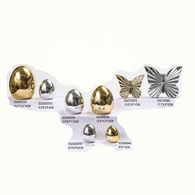 China Unique Painting Easter Bunny Egg Decoration Ceramic Gold Easter Home Decorations for sale