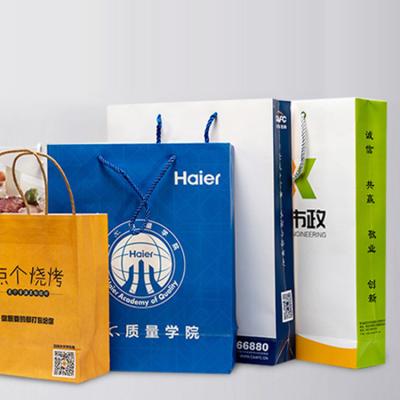 China Custom Printed Paper Bag Suppliers Recyclable Custom Paper Bag With Handle Shopping Paper Bag for sale