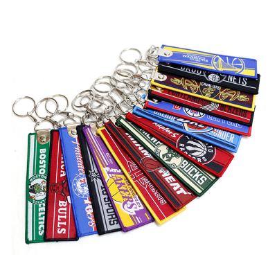 China Promotional Gift Personalize Promotional Gifts Custom Keychain Cloth Embroidery Cheap Woven Car Keychains Jet Tag for sale