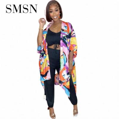 China 2021 New Arrival Breathable Autumn Coat Split Irregular Fork Printing Woman Tops Fashionable Ladies Blouses Tops for sale