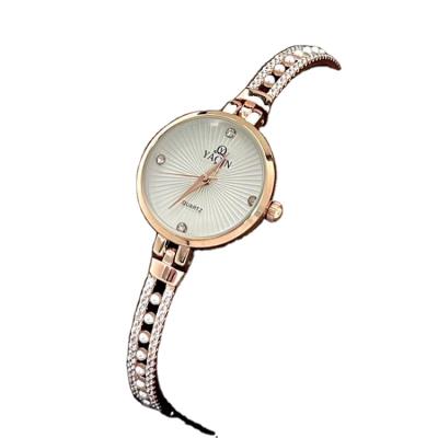 China Alarm Ladies Watch Luxury Small Temperament Waterproof Ladies Watch for sale