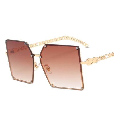 China Hollow-out metal chain Korean style fashion sunglasses large square frame rivet lady sunglasses street flat glasses for sale