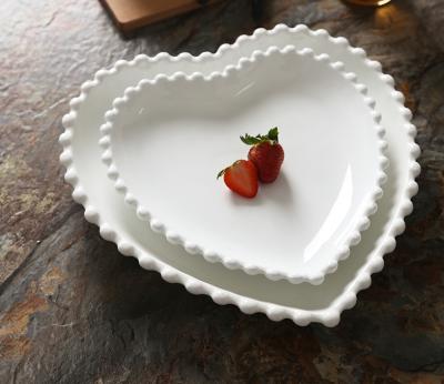 China Sustainable heart shaped ceramic dish with stubs garnishes for snack sushi fruit appetizer dessert. for sale