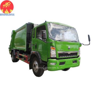 China 100% Sinotruck Hotels Brand New Howo RHD 6 Ton Garbage Compactor Truck For Sale for sale