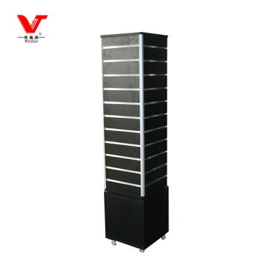 China Floor Standing 4 Sided Free Standing Black Rotary Slatwall Rack With Wheels for sale