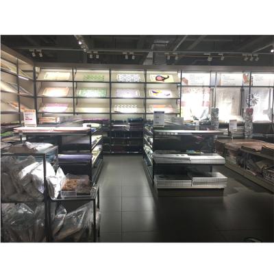 China Free Standing Custom Make Floor Metal Wall Mounted Fabric Display Rack for sale