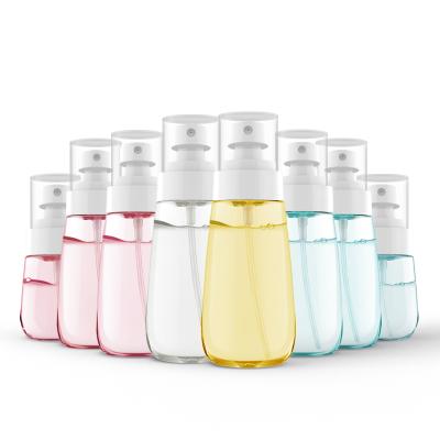 China High Quality Exquisite Cosmetic Perfume Container Water Bottle Shape Personal Care Droplet Spray UPG Plastic Bottles For Travel for sale