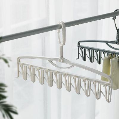 China Durable PP Plastic Material Multifunctional Laundry Plastic Hanger Dryer For Kids Adults for sale