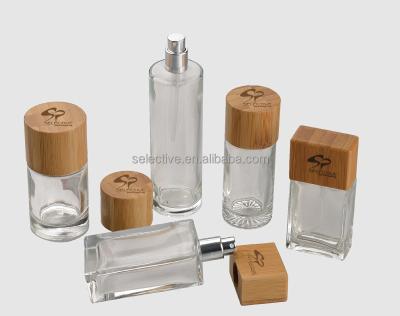 China Perfume Sprayer Empty Glass Perfume Bottles With Wooden Sprayer Cap Lids Cap for sale