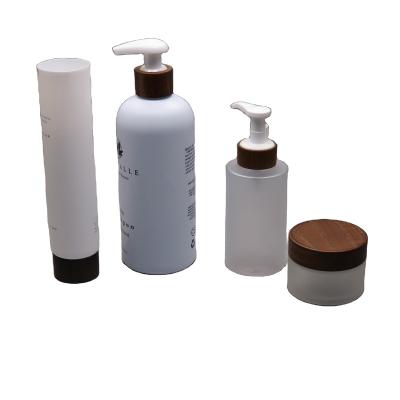 China 28/410 Switch Recyclable Lotion Pump For Shampoo Bottle State Plastic Bottle Wooden Pump for sale