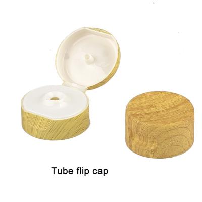 China Wooden Cosmetic Bottle Water Transfer Printing Cap Mold 35mm Tube 40mm PE Tube Screw 50mm Cap for sale