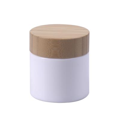 China Medicine Cannabis 120ml Capacity White Glass Jar With Lid CBD CR Bamboo Wooden Container Kid Resistant Cap for sale