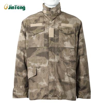 China Men's Breathable Camouflage Softshell Jacket Tactical Concealed Military Coat for sale